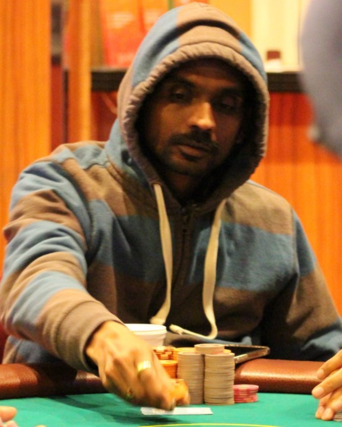 Bosu Babu Avunoori at a poker table
